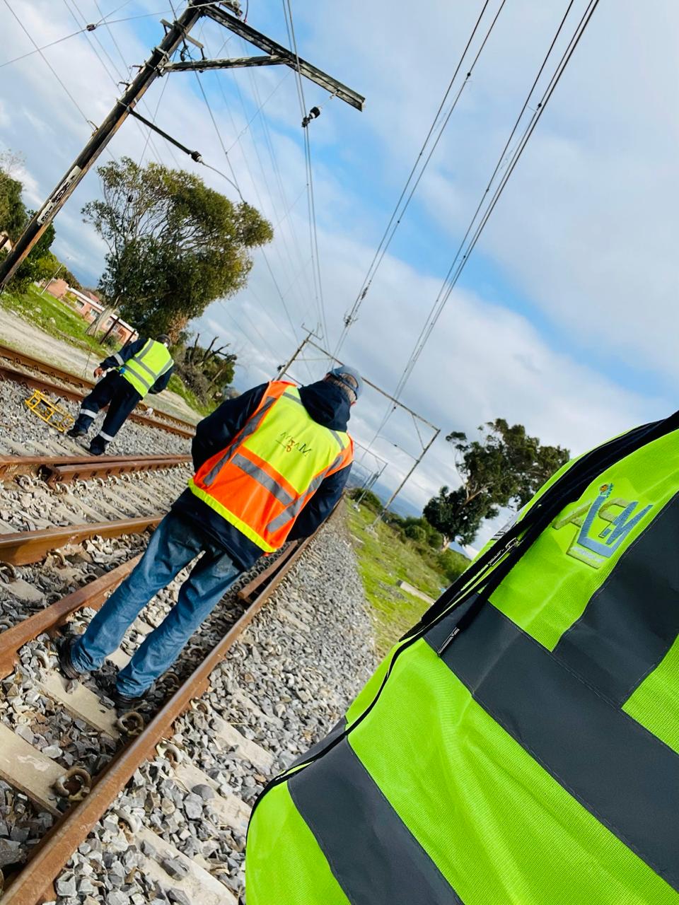 MPIA field technician on active rail line